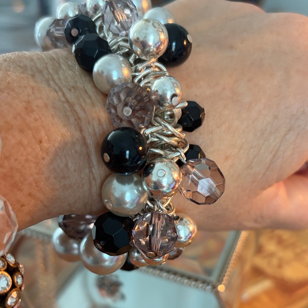 PRICE. CUT 
CHA CHA Silver and Black Beaded Stretch Bracelet